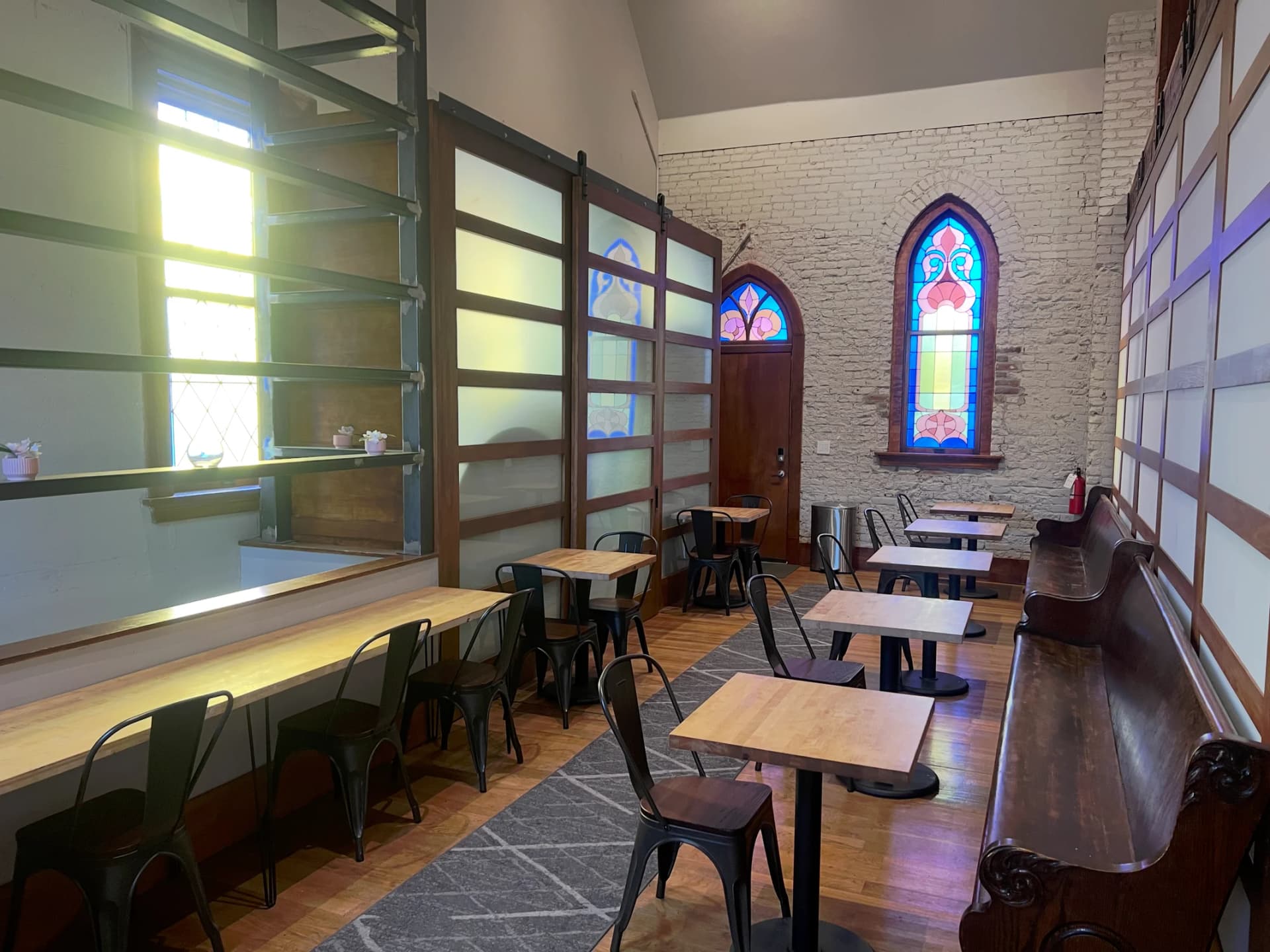Natural light streams through historic windows