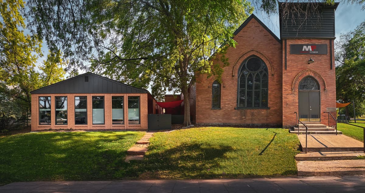 Historic Merritt Wellness building exterior showing 1905 church architecture