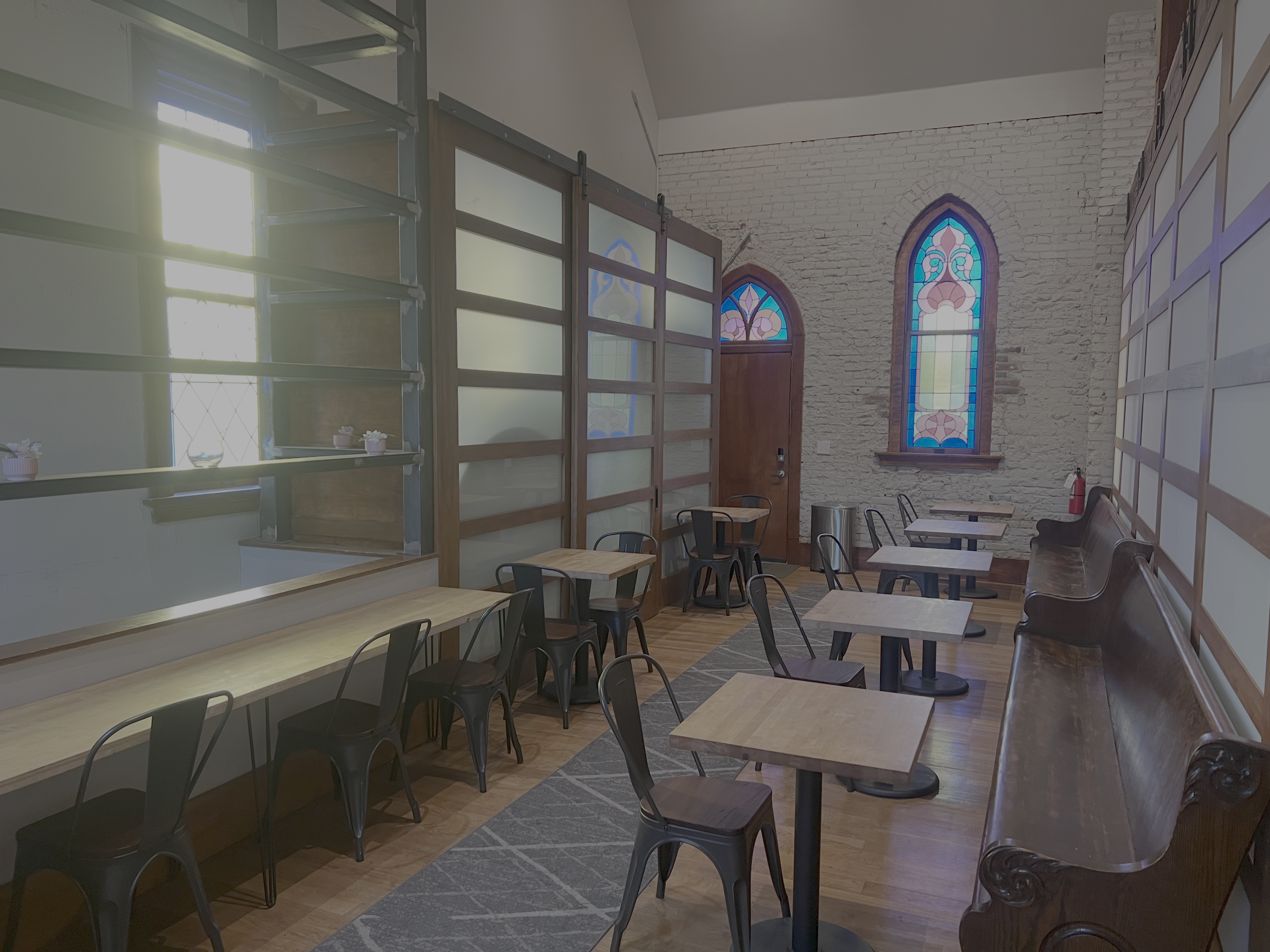 Natural light streams through historic windows